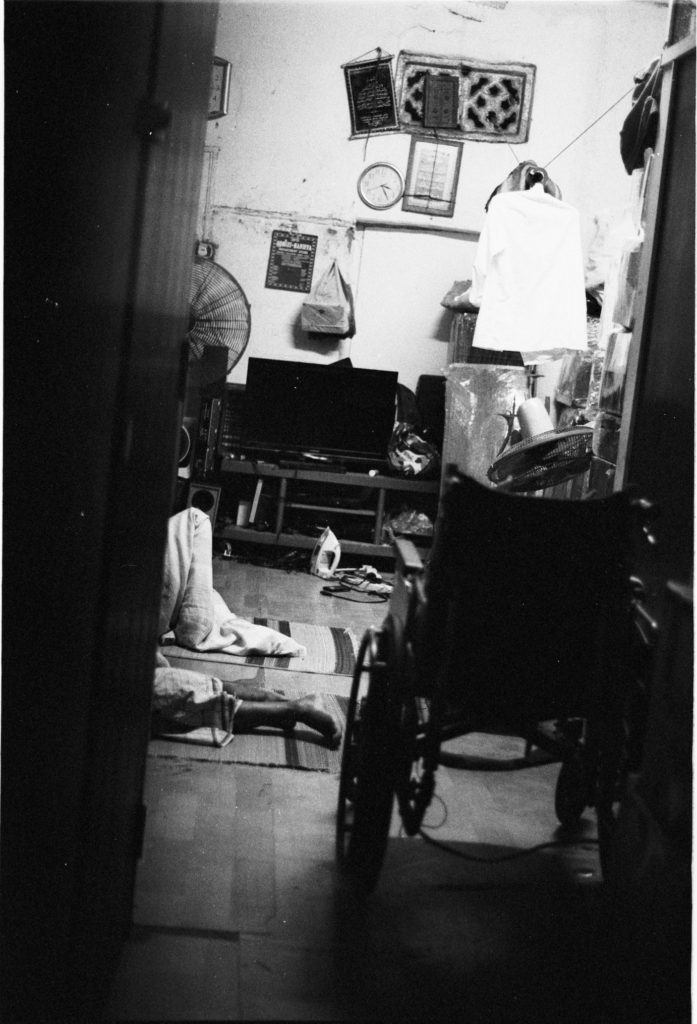 Little India, Singapore. Singapore is a pretty safe country, as evidenced by this family sleeping with the door to their home open. It does get warm here though, even during the nights, so the big fan was blasting away and the open door helped in air circulation. Homes like these situated in run down looking shophouses might look unkempt but the land they’re sitting on is literally worth millions in the land-starved country of Singapore.