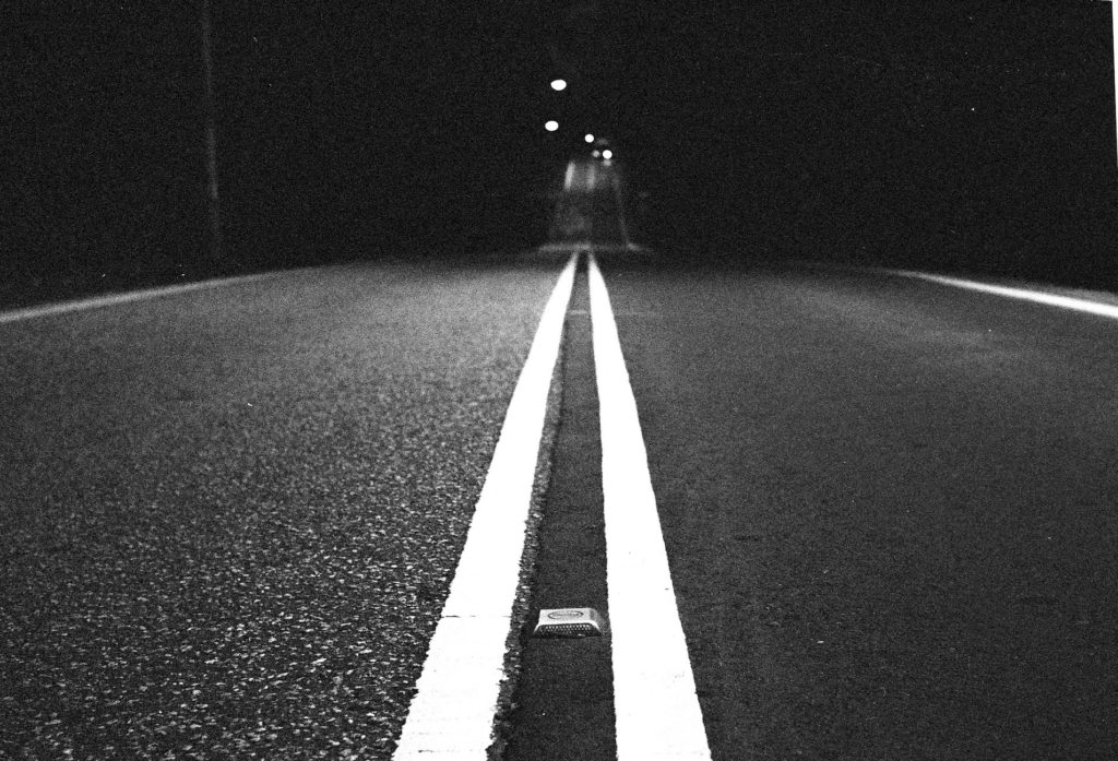 Punggol, Singapore. I was looking for high-contrast scenes with minimalistic elements. In fact, this will be a theme for my next series of photographs. I imagine it to be a love letter to Michael Kenna and Ralph Gibson. Anyway, roads here are usually either very busy, or straight as a ruler. I like the undulating back-roads found here, as they can add depth to the image.